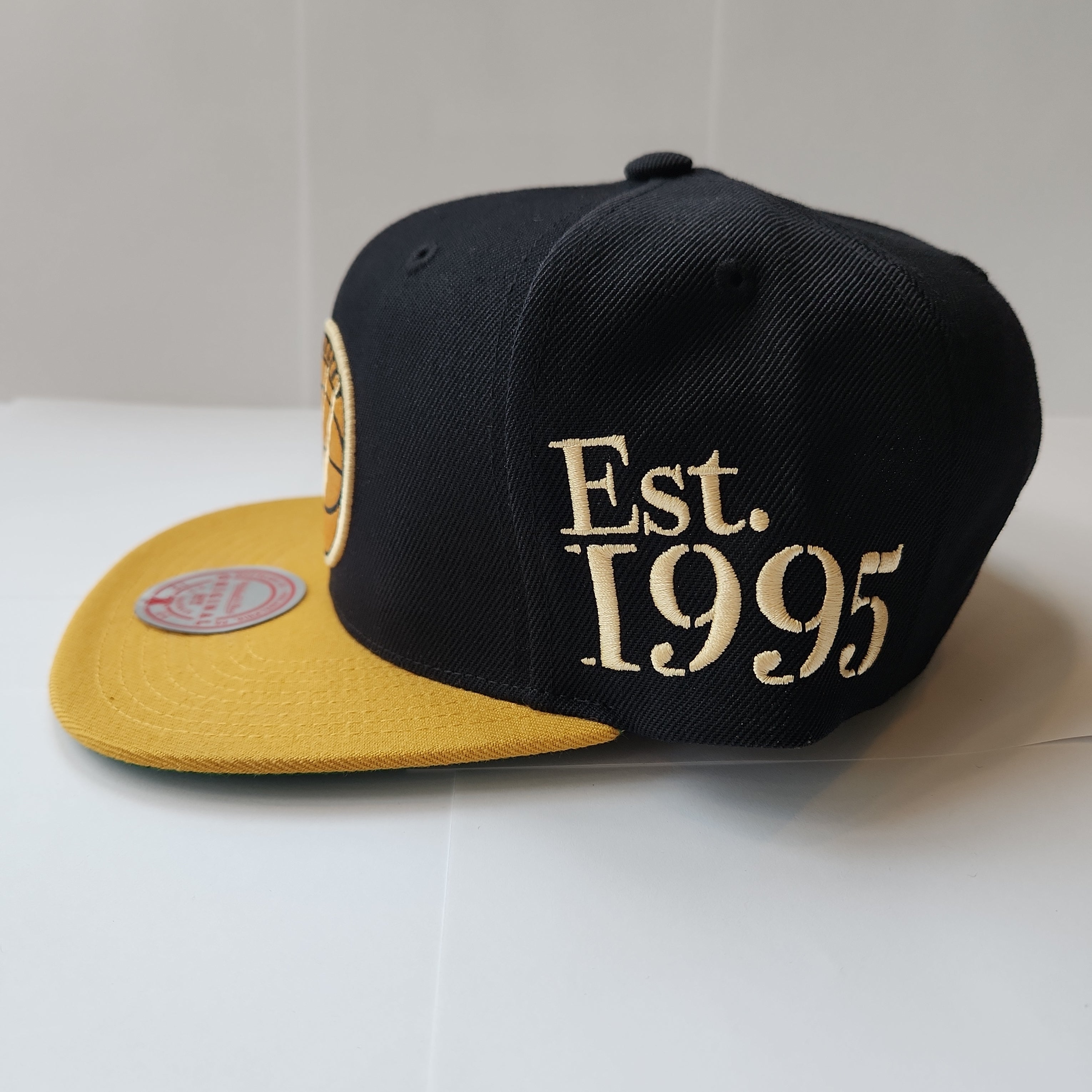 Toronto Raptors NBA Mitchell & Ness pour hommes Black Eye of The Tiger Snapback