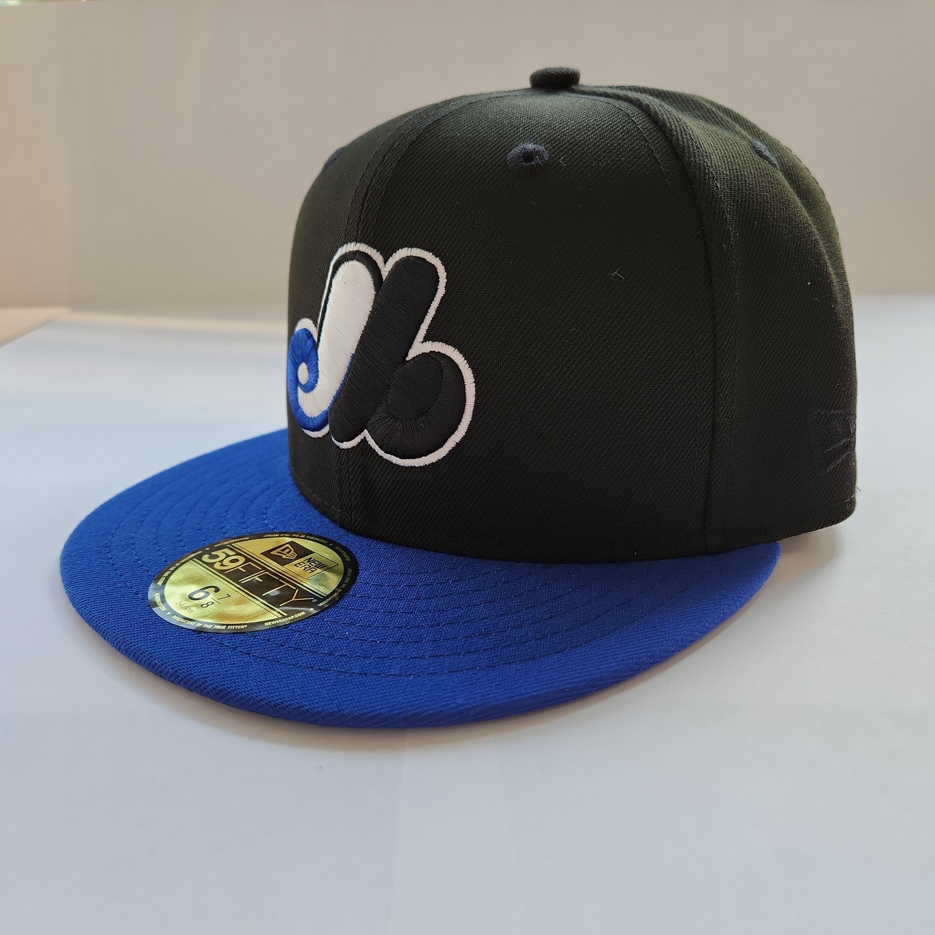 Montreal Expos MLB New Era Men's Black/Royal Blue 59Fifty Cooperstown Fitted Hat