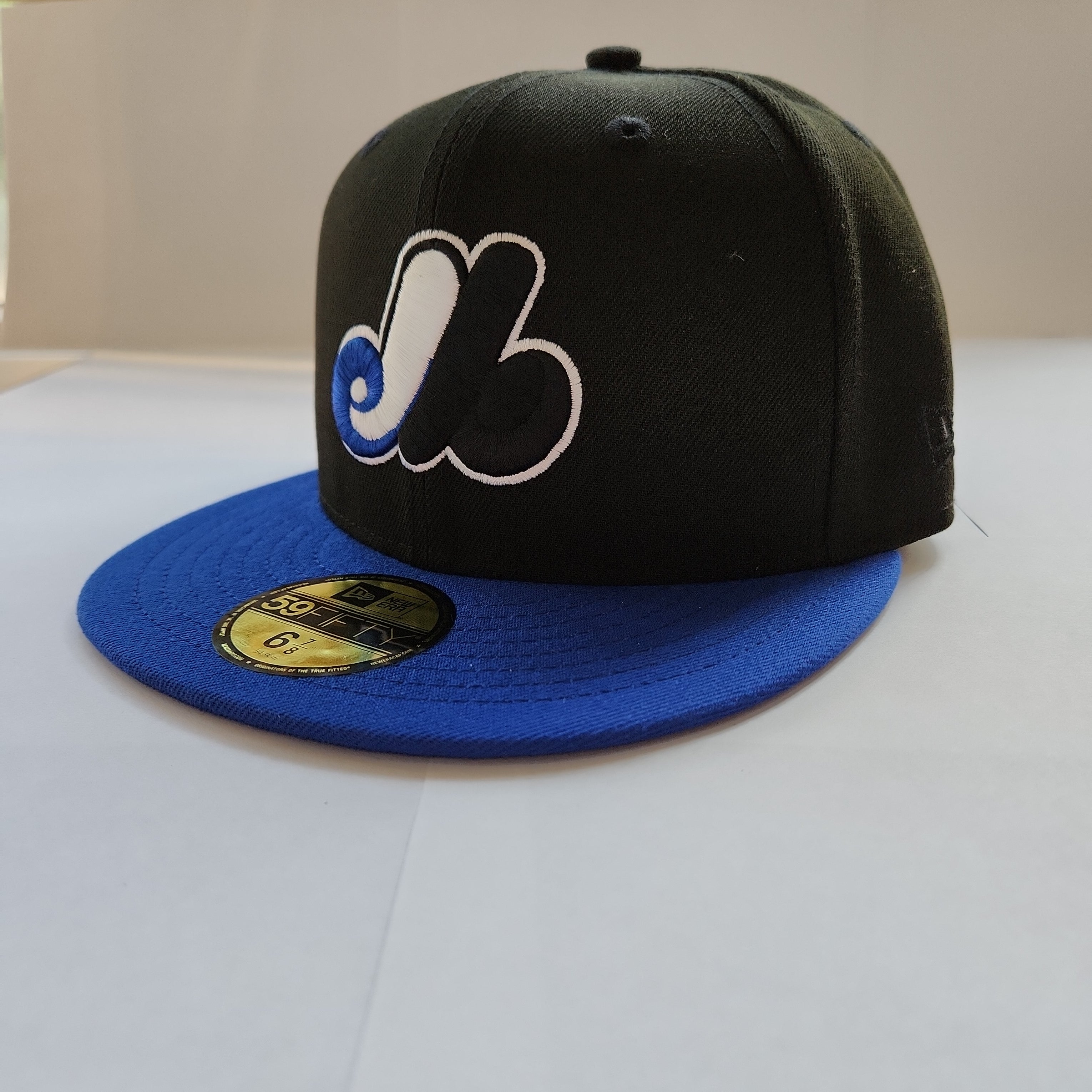 Montreal Expos MLB New Era Men's Black/Royal Blue 59Fifty Cooperstown Fitted Hat